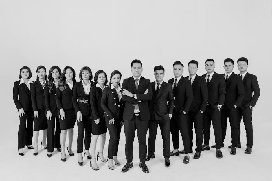 Black and white portrait of a diverse business team in a studio setting